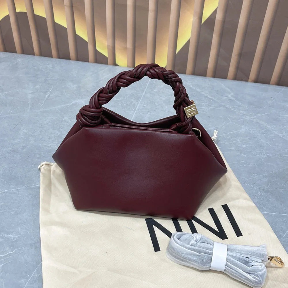 Women's premium soft leather dumpling bag with woven rope handle, elegant and casual everyday crossbody/shoulder bag.